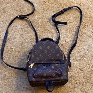 Faux {LV} mini backpack